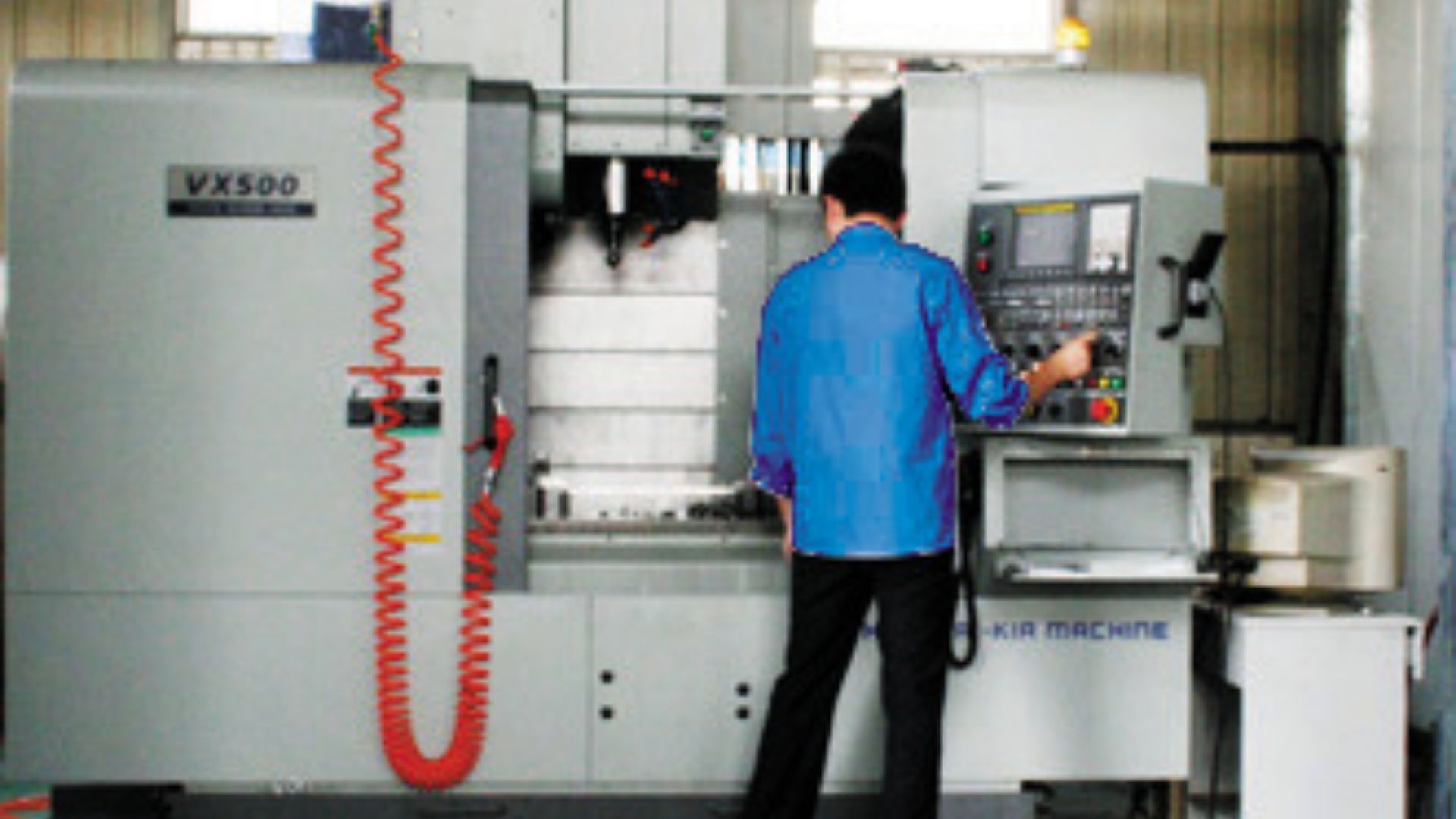 Cutting Process - Precision cutting machinery in operation with safety protocols